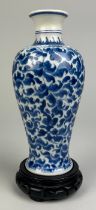 A CHINESE BLUE AND WHITE VASE KANGXI PERIOD OR LATER 19TH CENTURY, Artemisia leaf to verso. 19cm H