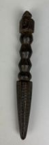 A WOODEN TIBETAN PHURBA 23cm x 3cm