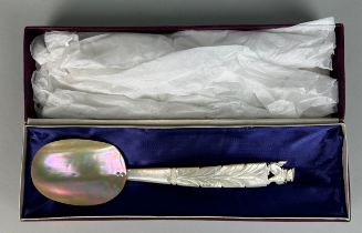 A CHINESE MOTHER OF PEARL SPOON, In presentation box. Spoon 28cm L