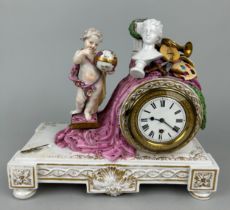 AN UNUSUAL 18TH OR 19TH CENTURY MEISSEN MANTLE CLOCK WITH A PUTTI HOLDING A GLOBE,