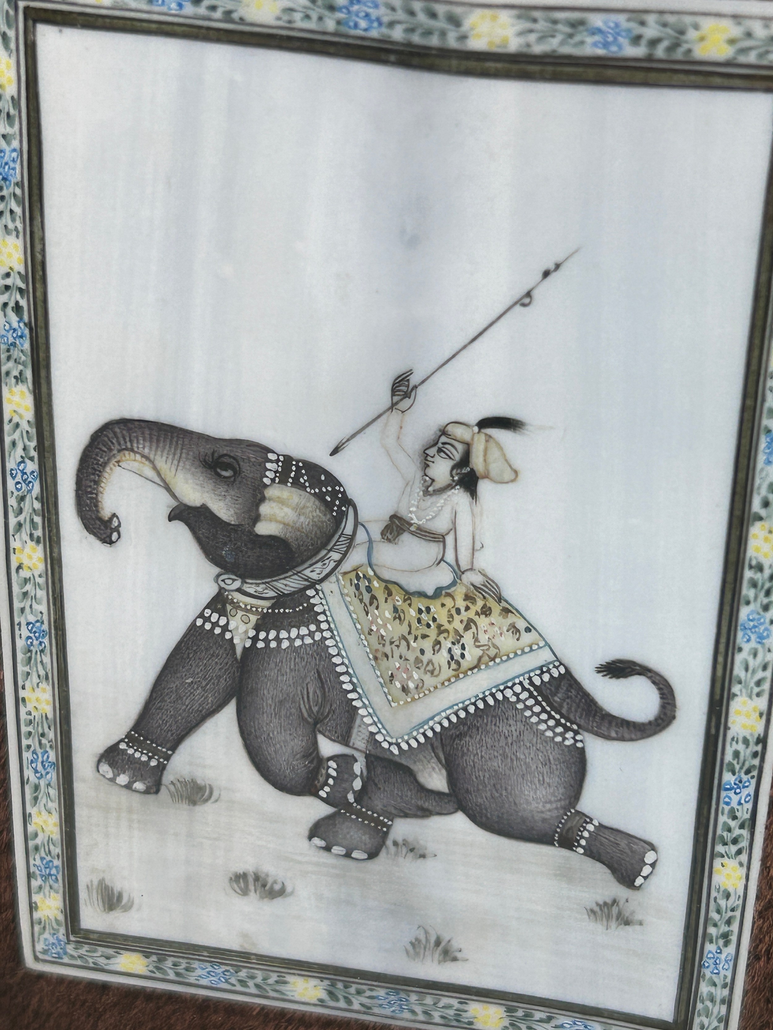 A 20TH CENTURY INDIAN ALBUM PAGE DEPICTING A FIGURE HOLDING A SPEAR AND RIDING AN ELEPHANT, 10cm x - Image 2 of 2