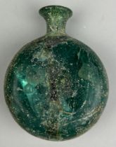 A GREEN LUSTROUS FLASK BOTTLE POSSIBLY ROMAN, 10cm x 8cm