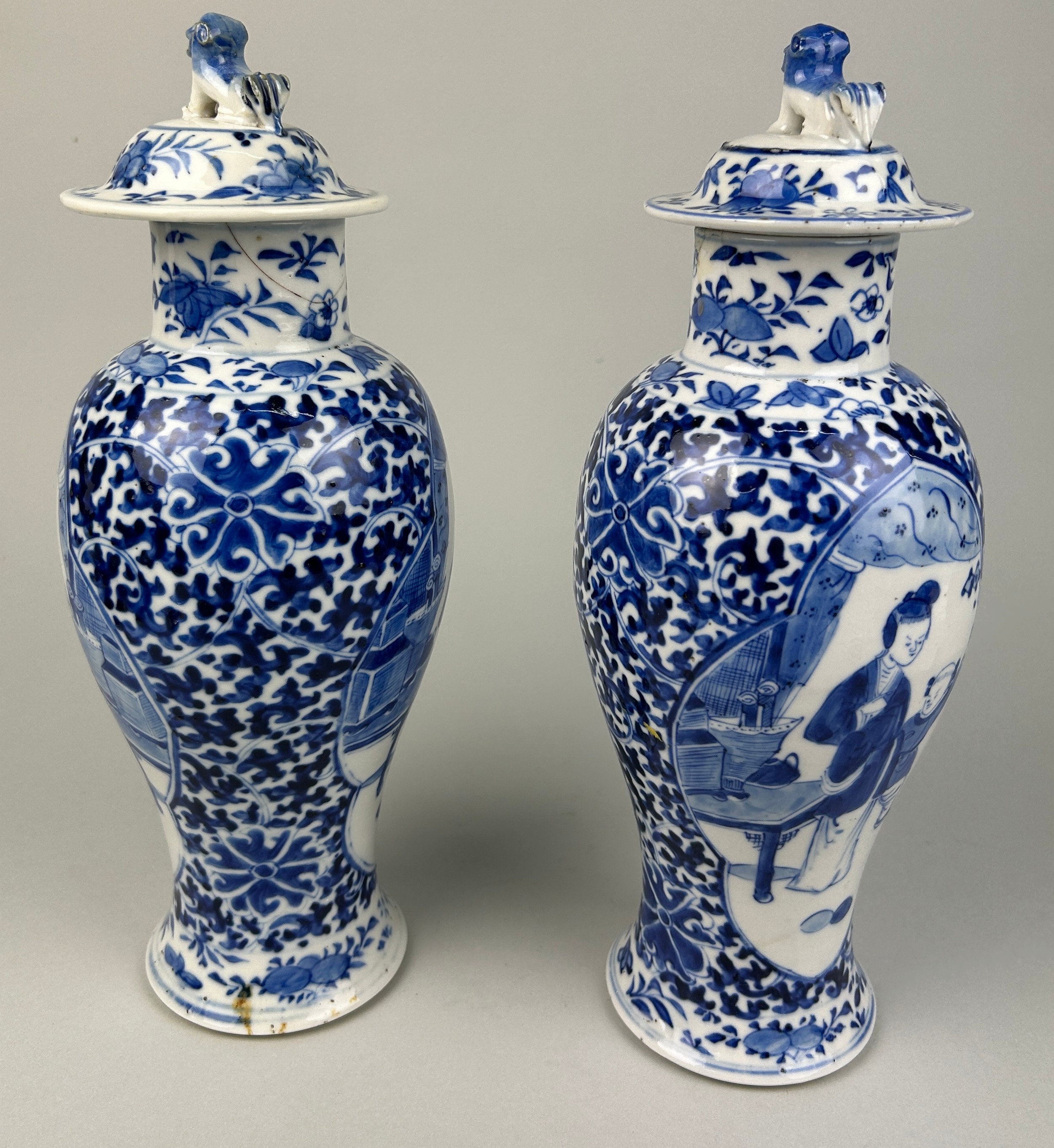 A PAIR OF 19TH CENTURY CHINESE BLUE AND WHITE PORCEALIN VASES WITH LIDS, Decorated with figures - Image 2 of 3