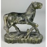 A CHINESE JADE COLOURED STONE FIGURE OF A HORSE, 16cm x 15cm