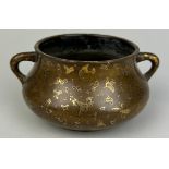 A CHINESE 17TH OR 18TH CENTURY BRONZE CENSER WITH GOLD SPLASH, Marked underneath with apocryphal six