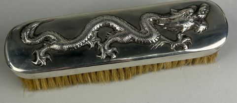 A SILVER CHINESE EXPORT BRUSH WITH REPOUSSE FOUR CLAWED DRAGON, 16cm L