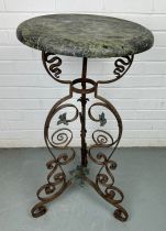 A WROUGHT IRON STAND WITH FLOWERS AND WITH GREEN MARBLE TOP, 85cm x 45cm