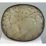 AN 18TH CENTURY CHINESE CARVED JADE PLAQUE DEPICTING FIGURES WITH AN ELEPHANT AND BATS AMONGST