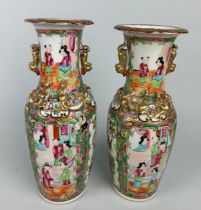 A PAIR OF 19TH CENTURY CHINESE CANTON VASES, 26cm H each.