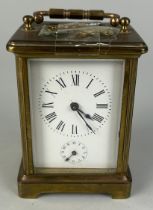 A FRENCH BRASS CARRIAGE CLOCK, One glass side missing.