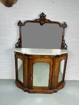 A 19TH CENTURY MAHOGANY WALNUT CREDENZA WITH WHITE MARBLE TOP, The mirrored back with carved central