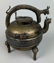 A 20TH CENTURY CHINESE BRASS INCENSE BURNER ON TRIPOD FEET, 9cm x 9cm