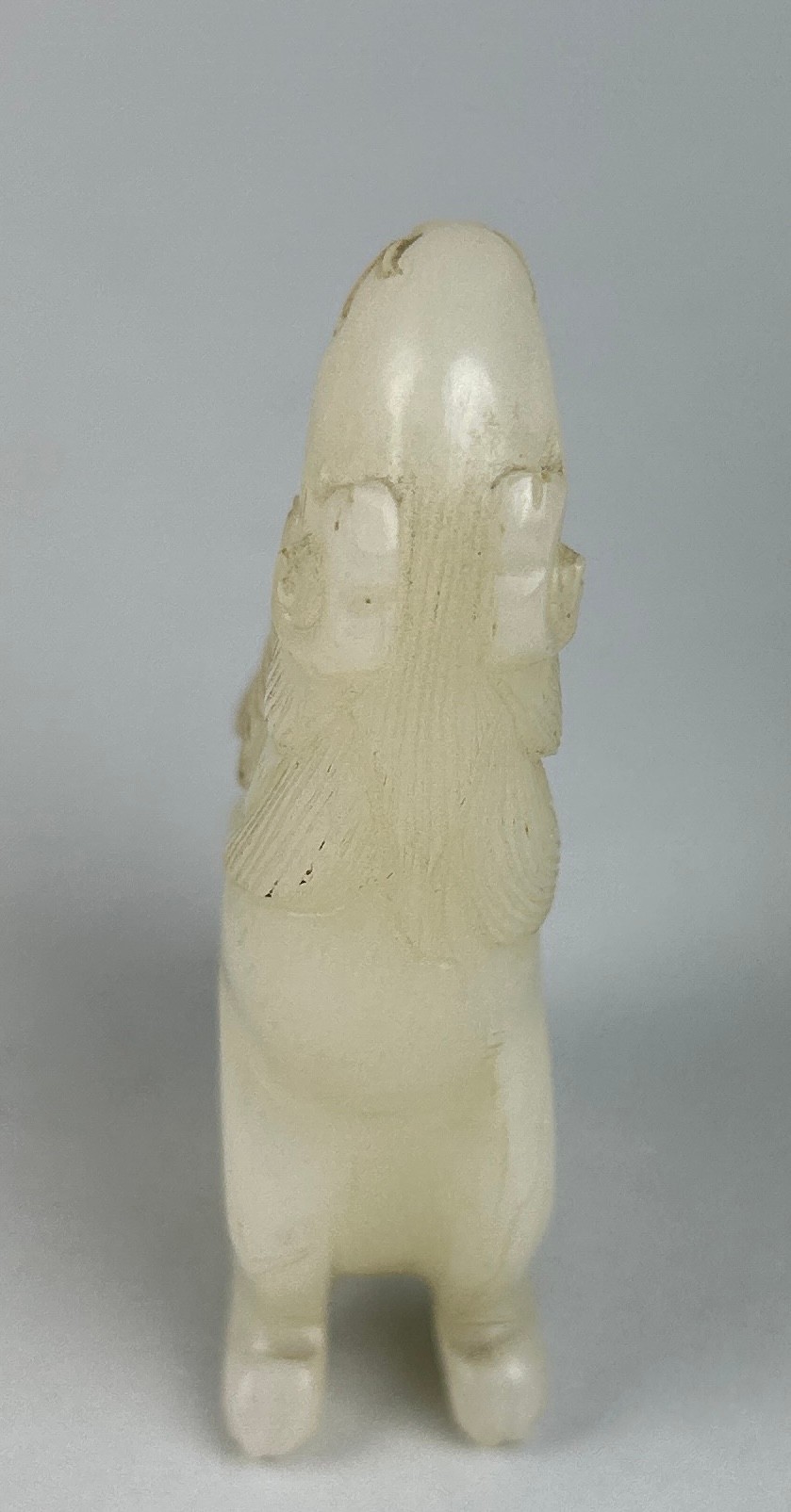 AN EARLY 19TH CENTURY CHINESE WHITE JADE GROUP OF A LION, 7.5cm x 4.7cm x 1.8cm - Image 4 of 4