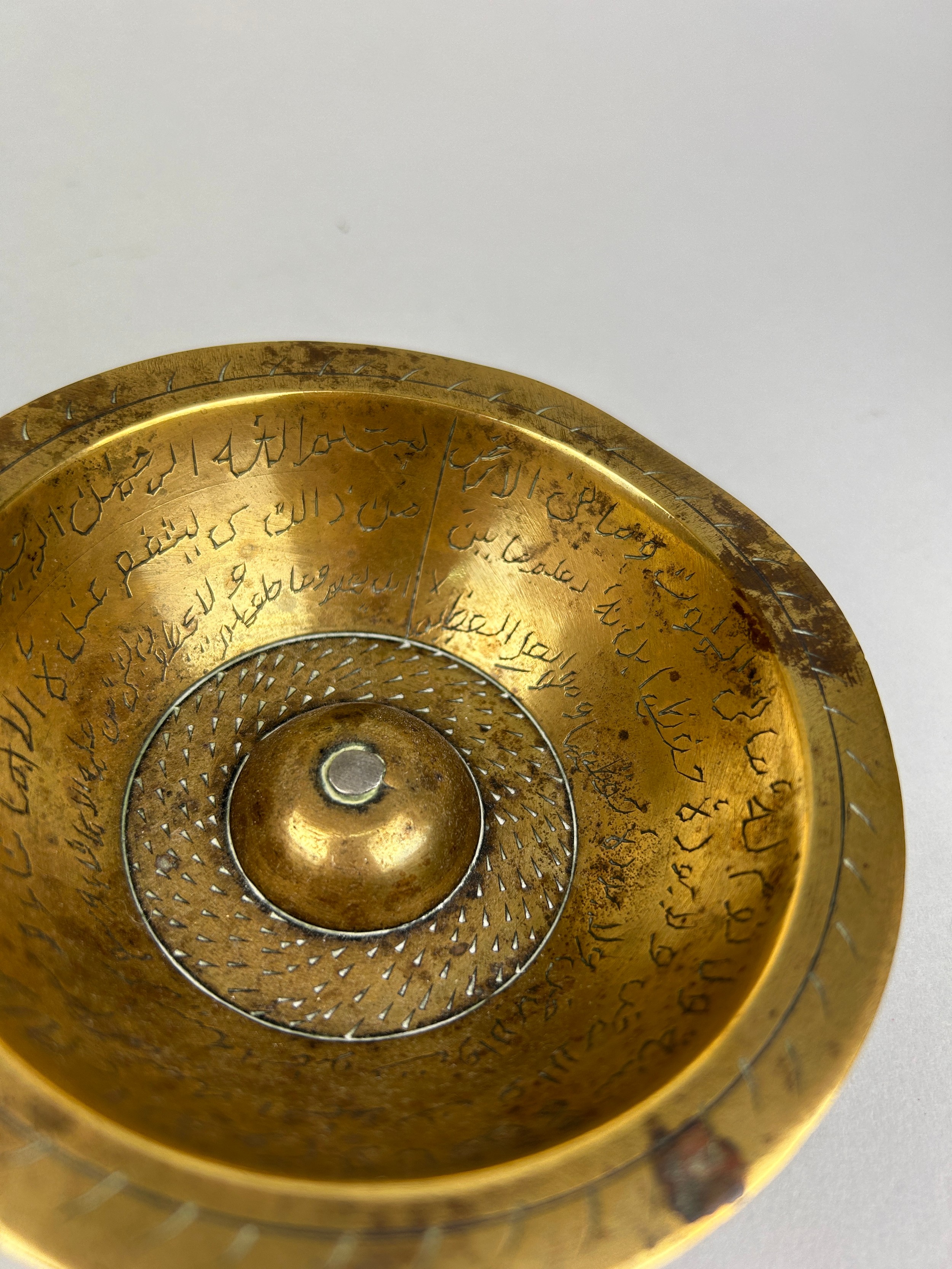 A 19TH CENTURY ISLAMIC VESSEL ENGRAVED WITH VERSES FROM THE QURAN, 11.5cm x 3cm - Image 2 of 2