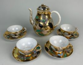 A JAPANESE PORCELAIN PART TEA SET, Painted and gilded. Consisting of a tea pot and lid, four cups