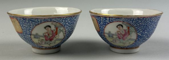 A PAIR OF CHINESE PORCELAIN BLUE WINE CUPS (2) Each with circular painted panels depicting figures