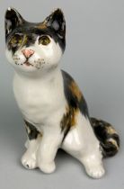 A CERAMIC CAT WITH GLASS EYES POSSIBLY ITALIAN, 24cm H
