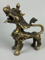 A 19TH CENTURY GILT BRONZE FIGURE OF A LION, 15cm x 13cm