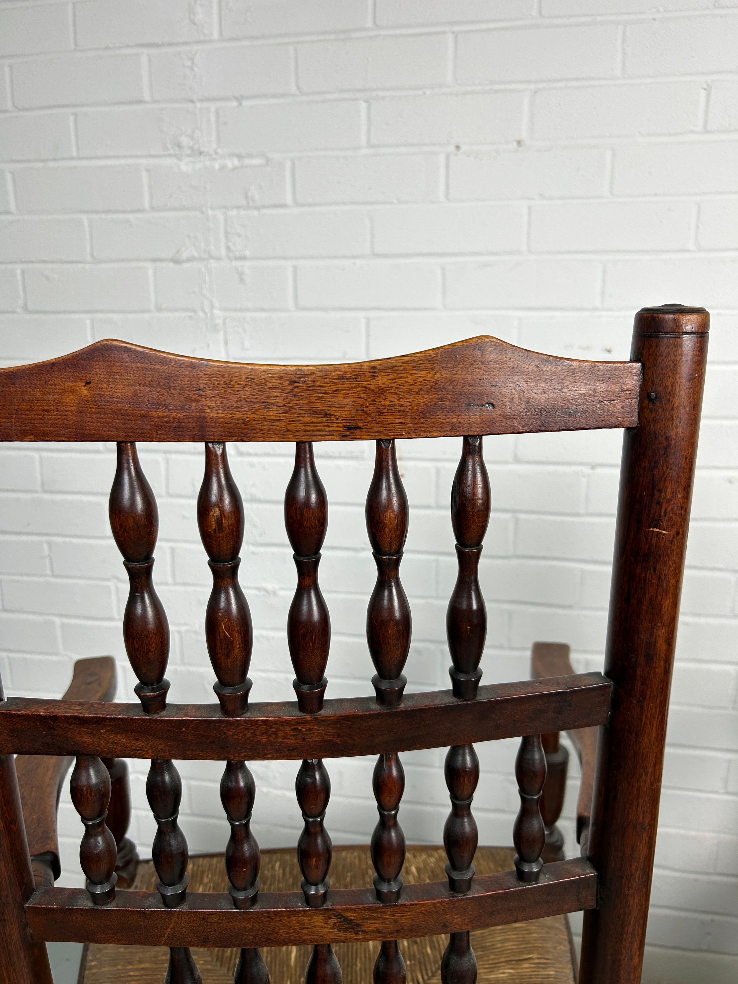 A SET OF EIGHT COUNTRY HOUSE BOBBIN SPINDLE BACK CHAIRS WITH RUSH SEATS PROBABLY NORTH COUNTRY, Late - Image 8 of 8