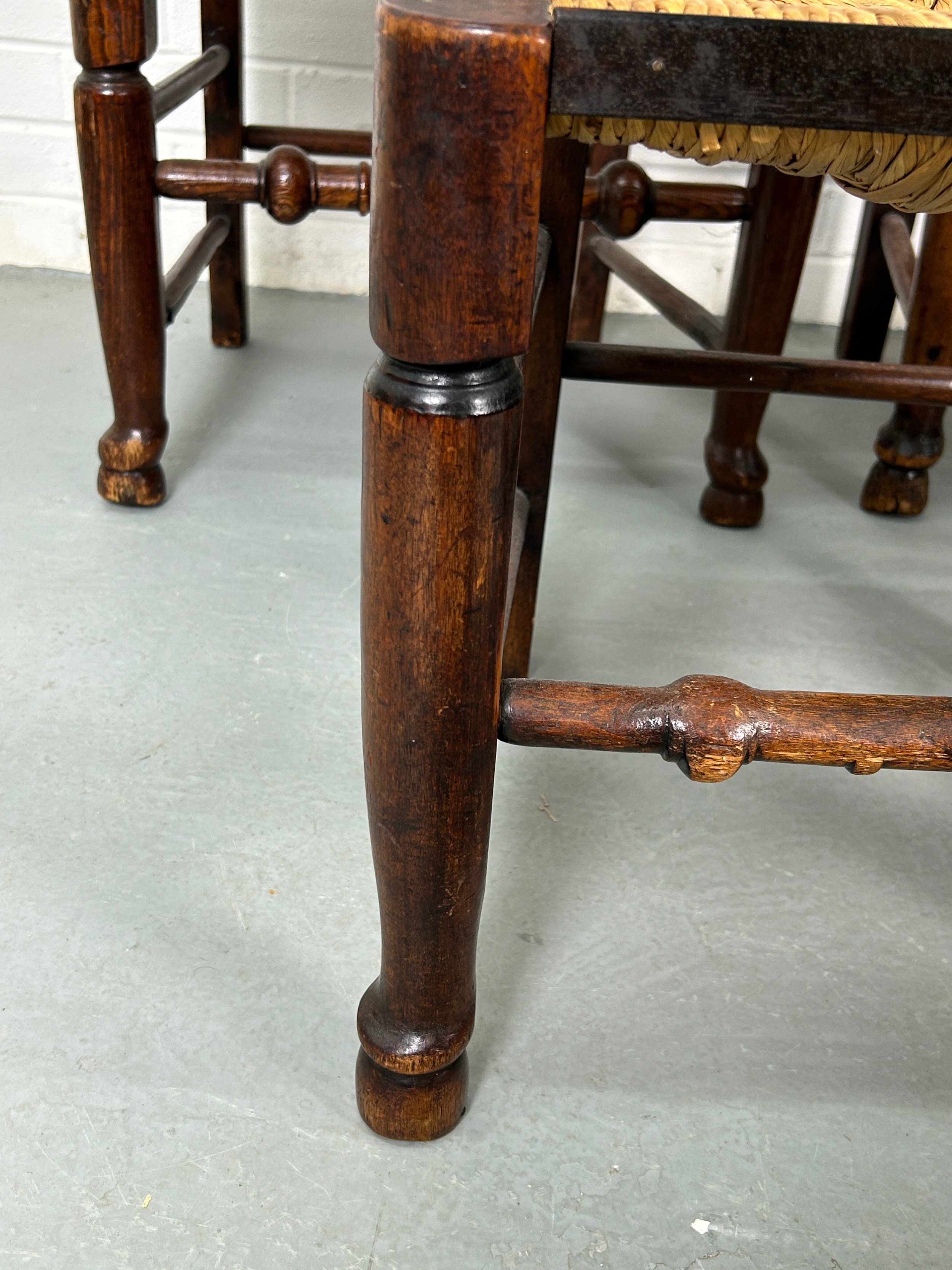 A SET OF EIGHT COUNTRY HOUSE BOBBIN SPINDLE BACK CHAIRS WITH RUSH SEATS PROBABLY NORTH COUNTRY, Late - Image 3 of 8