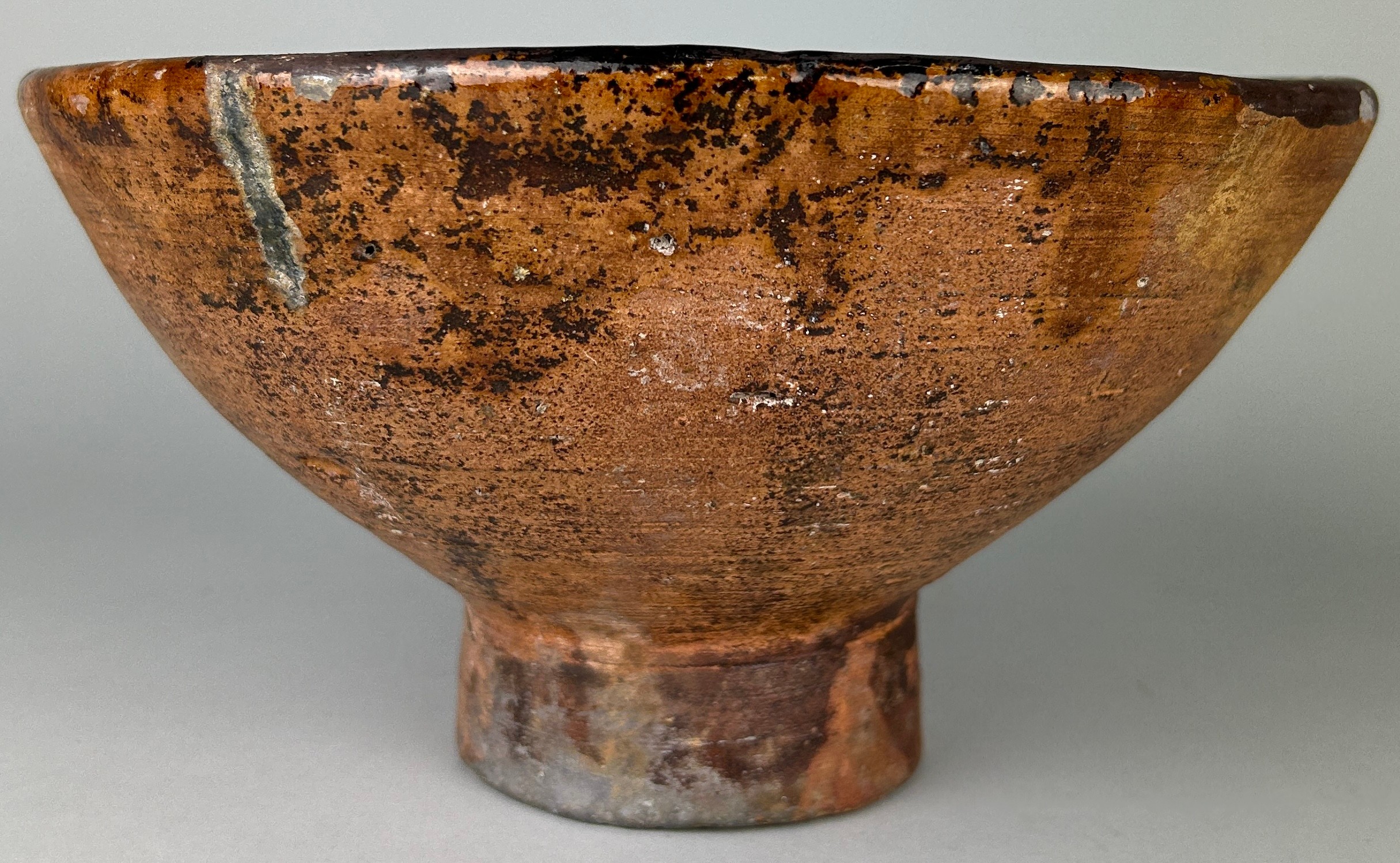 A 14TH CENTURY MAMLUK SLIPWARE POTTERY FOOTED BOWL, 24cm x 13cm Provenance: Purchased by the current - Image 3 of 8