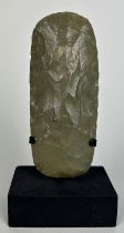 A NEOLITHIC GREEN JASPER FLAKED ADZE FROM THE AIR MOUNTAINS, NIGER, 12cm x 5cm