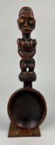 AN AFRICAN TRIBAL FANG SPOON ON STAND, 36cm x 11cm