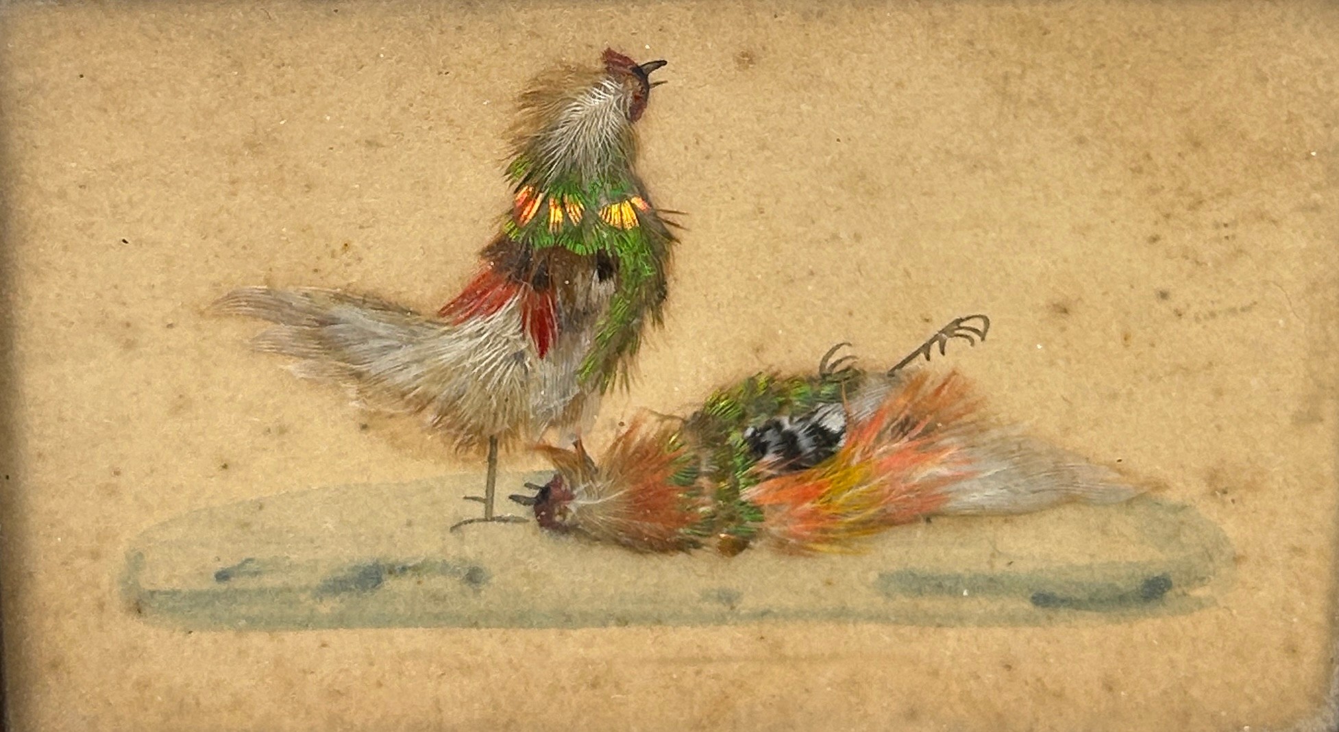 COCKFIGHTING INTEREST: A FRAMED SET OF THREE WATERCOLOURS WITH APPLIED BIRD FEATHERS DEPICTING A - Image 4 of 4