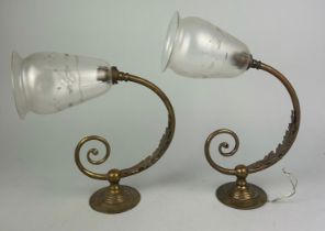 A PAIR OF BRASS WALL LIGHTS WITH ACANTHUS LEAF DESIGN AND GLASS SHADES (2) 25cm distance from