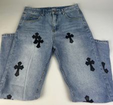 A PAIR OF CHROME HEARTS JEANS, Size 32.