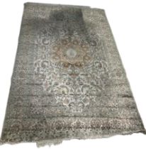 A PERSIAN DESIGN CARPET, 275cm x 180cm