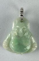 A CHINESE GREEN NATURAL JADE BUDDHA WITH GOLD AND DIAMONDS BAIL, Weight 11.5gms