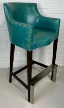 A LARGE BAR STOOL UPHOLSTERED IN BLUE LEATHER FABRIC WITH METAL STUDS, 122cm x 62cm x 70cm