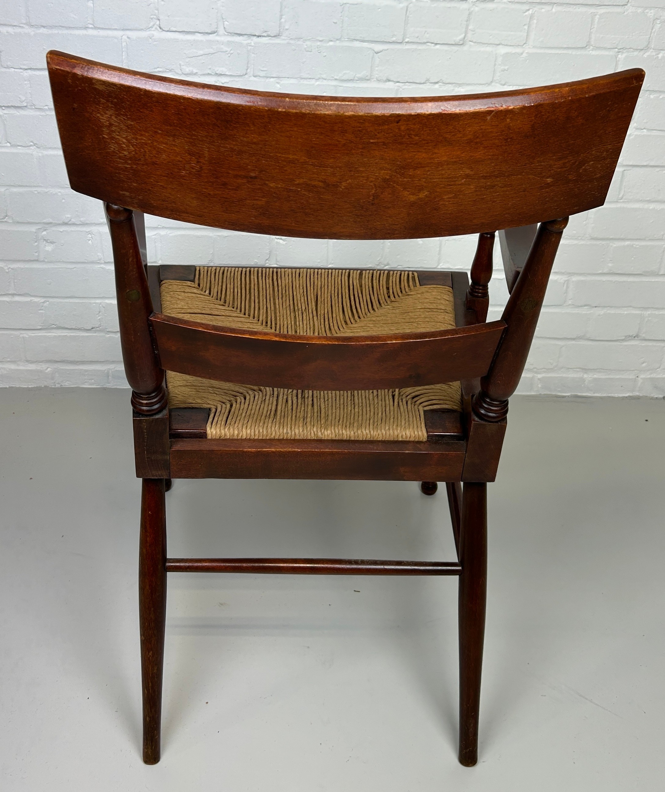 AN EARLY 20TH CENTURY ARMCHAIR OR DESK CHAIR, Flame mahogany with scroll arms and cane upholstered - Image 3 of 4