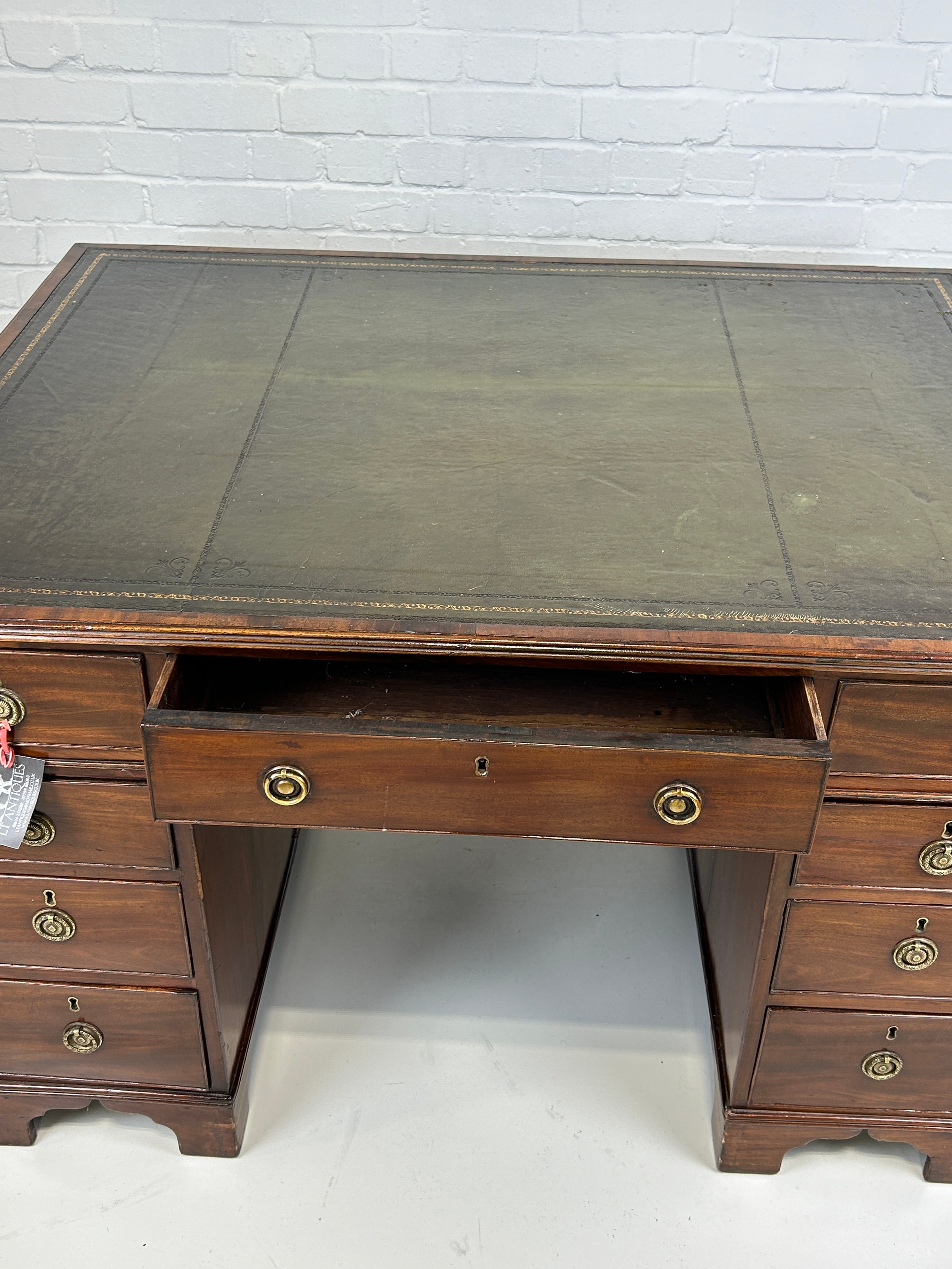AN EARLY 19TH CENTRAL PARTNERS DESK, Two pedestals, each with ten drawers with brass handles. - Image 9 of 12