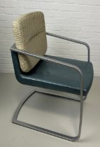 A ROLF BENZ ARMCHAIR, Chrome frame and blue leather seat with cream upholstered back cushion. 85cm x