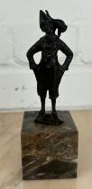 AFTER FRANZ IFLAND (1862-1925): A SIGNED BRONZE CLOWN WITH A CAT, 11cm H 16cm with stand.