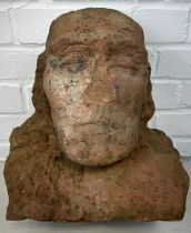A LIFE SIZE CARVED RED SANDSTONE BUST, Possibly Medieval. 32cm x 29cm