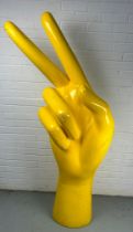 A MID CENTURY DESIGN 'PEACE' SIGN SCULPTURE, Yellow painted fibreglass. 172cm H x 55cm W x 44cm D