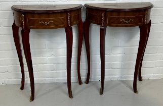 A PAIR OF DEMI LUNE FRENCH STYLE CONSOLE TABLES WITH GILT METAL MOUNTS AND MARQUETRY DETAIL,
