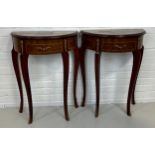 A PAIR OF DEMI LUNE FRENCH STYLE CONSOLE TABLES WITH GILT METAL MOUNTS AND MARQUETRY DETAIL,