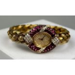 AN 18CT GOLD, RUBY AND DIAMOND SET LADIES WRISTWATCH, Weight 63.1gms