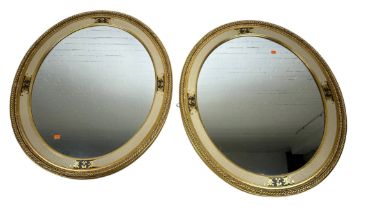 A PAIR OF OVAL WALL MIRRORS (2), 71cm x 62cm