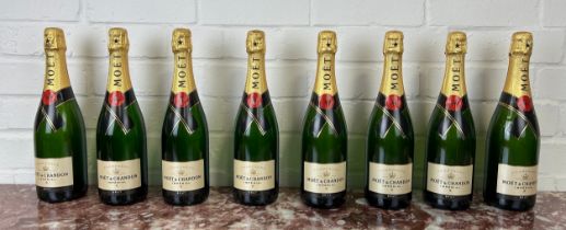 A GROUP OF EIGHT DISPLAY DUMMY MOET AND CHANDON BOTTLES (SEALED AND EMPTY), 31cm H each.