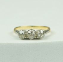 AN 18CT GOLD ENGAGEMENT RING SET WITH THREE DIAMONDS, Weight: 2.19gms