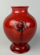 WILLIAM MOORCROFT (1872-1945): A RED FLAMMINIAN WARE VASE MADE FOR LIBERTY AND CO, 17cm in height.