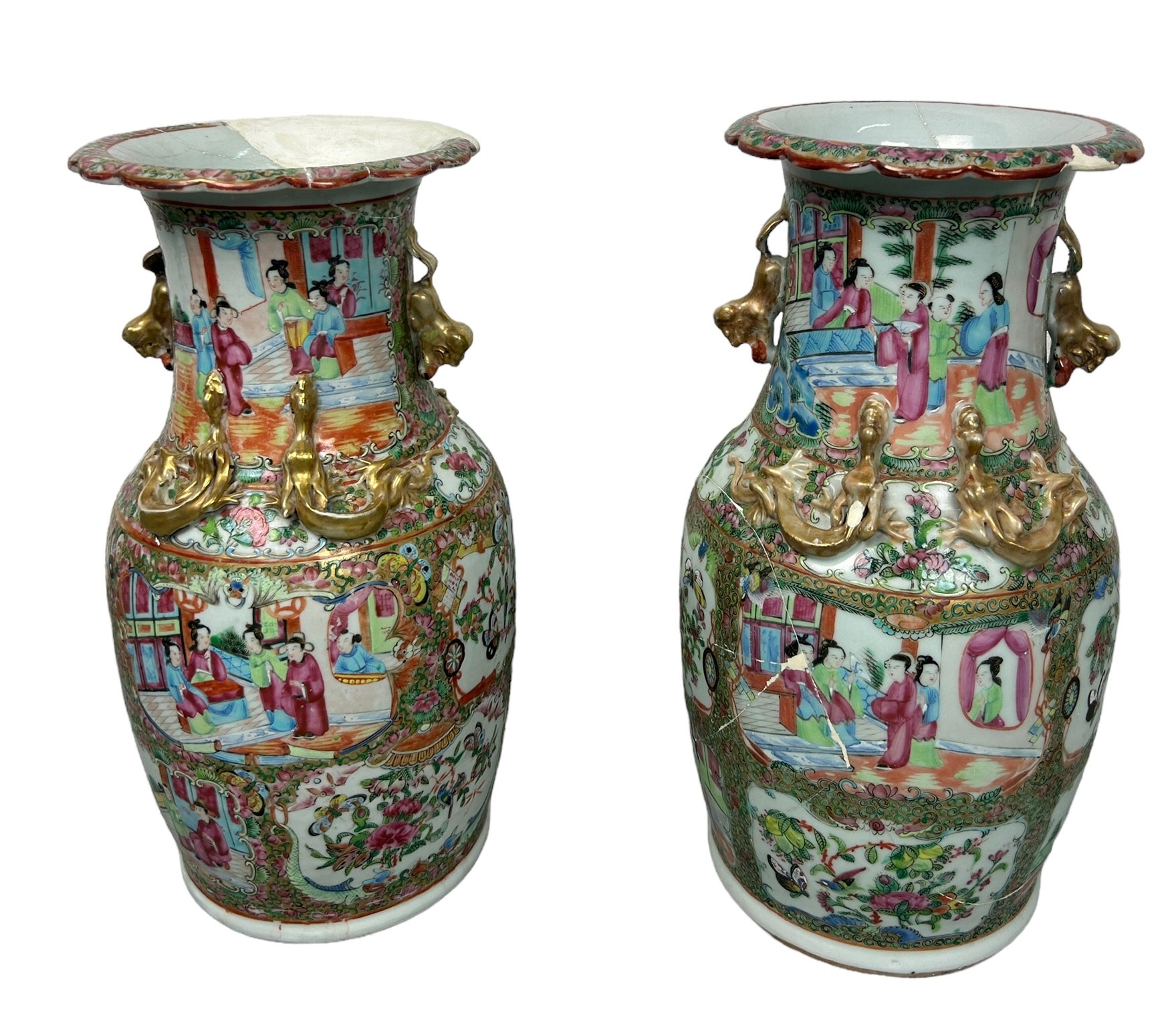 A PAIR OF PINK CHINESE CANTON FAMILLE ROSE VASES, 35cm H each.