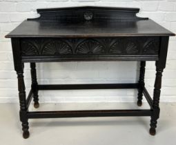 AN EBONISED AESTHETIC DESIGN TABLE, 88cm x 70cm x 38cm