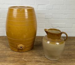 A LARGE CERAMIC BARREL AND RELATED JUG (2)