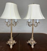 A PAIR OF FRENCH STYLE SILVERED METAL TABLE LAMPS WITH SHADES (2),